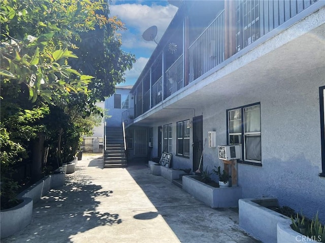 view of home's exterior featuring cooling unit