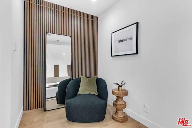 sitting room with light wood-type flooring