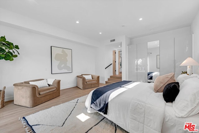 bedroom featuring light hardwood / wood-style flooring