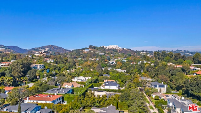 drone / aerial view featuring a mountain view