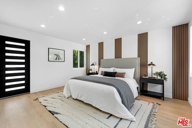 bedroom featuring light hardwood / wood-style floors