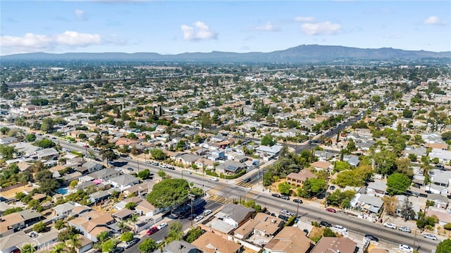 drone / aerial view featuring a mountain view