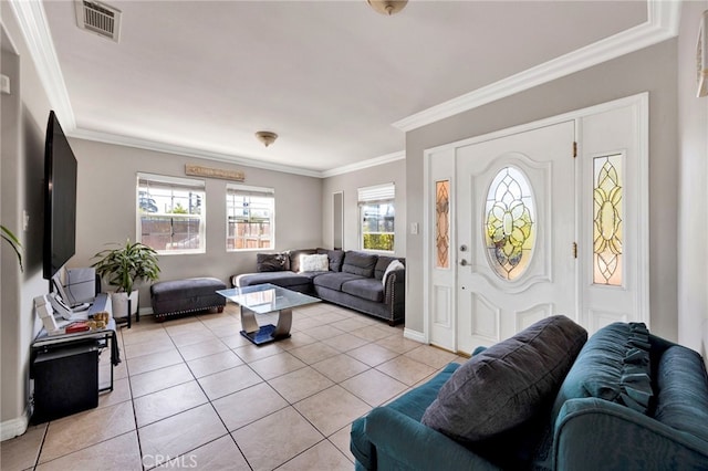 living room featuring a wealth of natural light, light tile patterned floors, and ornamental molding