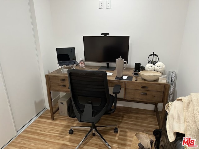 office area with wood-type flooring