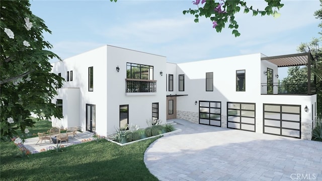 contemporary house with a balcony, a garage, and a front lawn