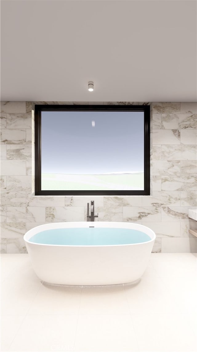 bathroom with tile walls and a washtub