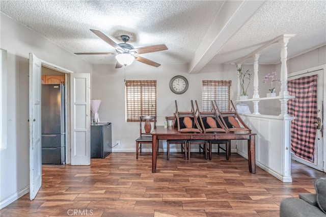 miscellaneous room featuring a textured ceiling and ceiling fan