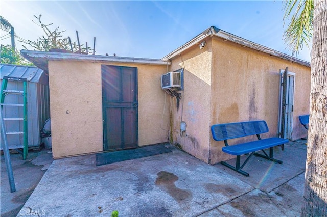 back of house featuring a patio