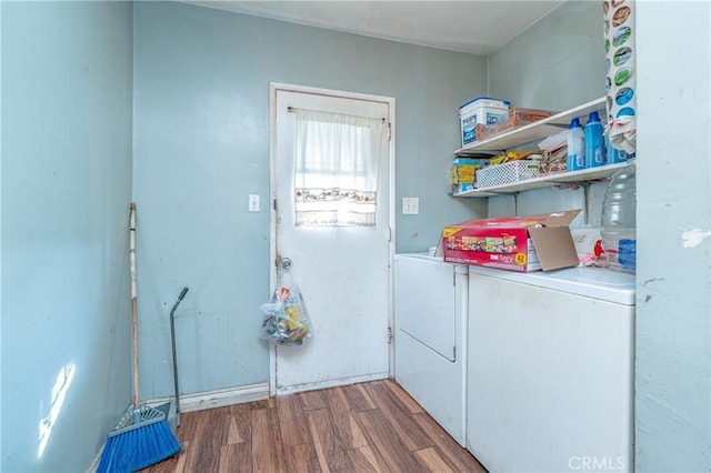 laundry room with dark hardwood / wood-style flooring and independent washer and dryer