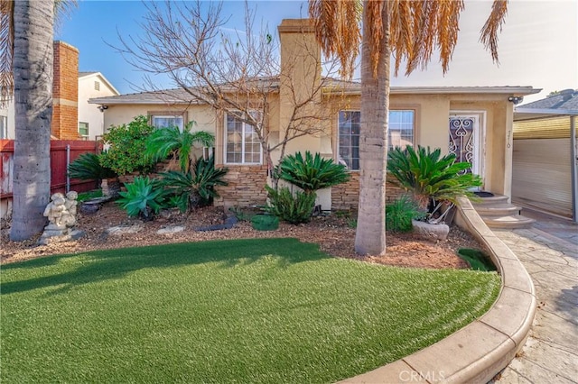 view of front of house with a front lawn