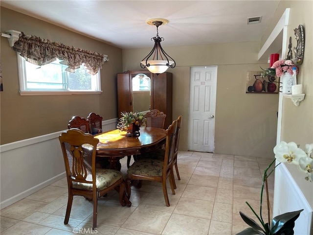 dining room featuring light tile patterned floors