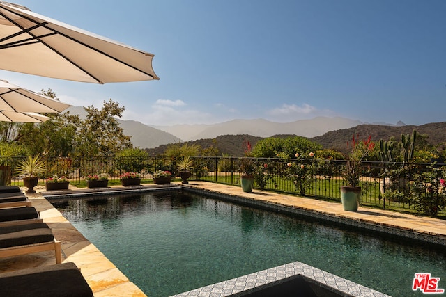 view of pool featuring a mountain view