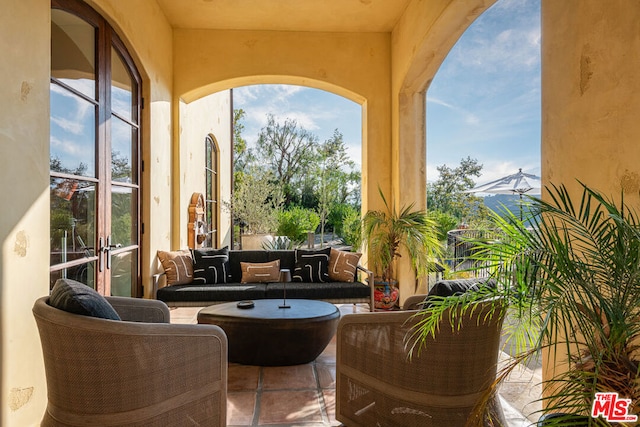 view of patio / terrace featuring a balcony and outdoor lounge area