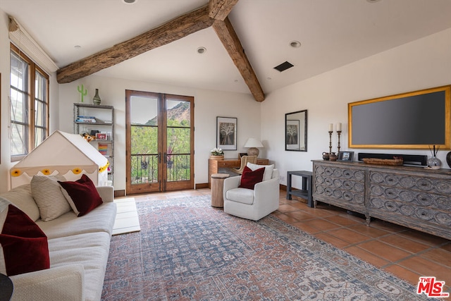 living room featuring french doors and vaulted ceiling with beams