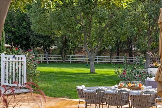 view of yard with a wooden deck