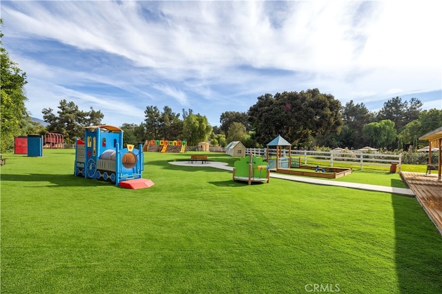 view of play area featuring a lawn