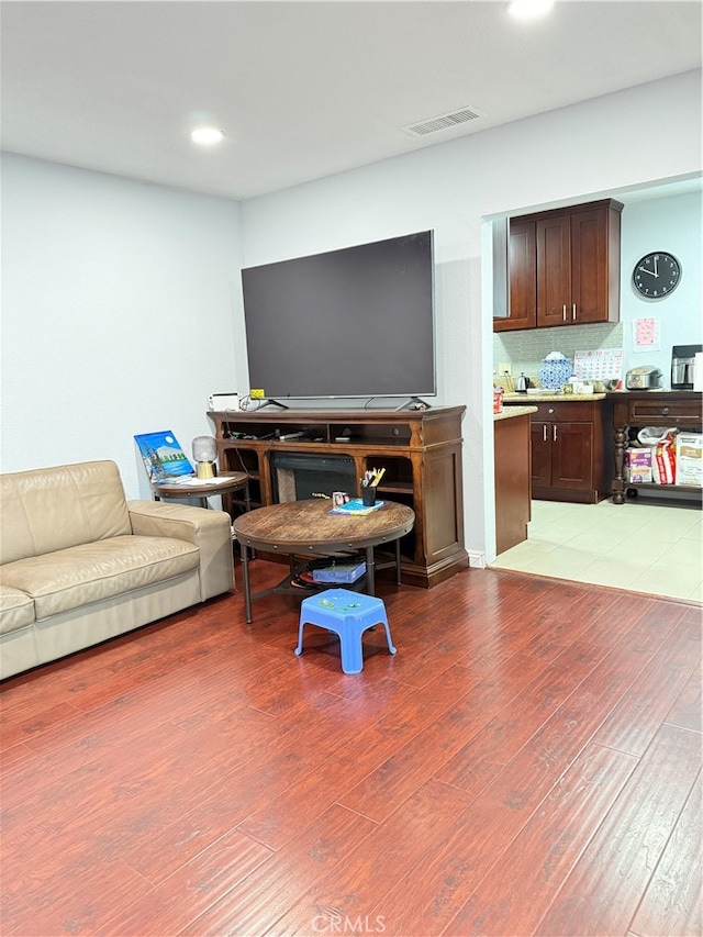 living room with wood-type flooring