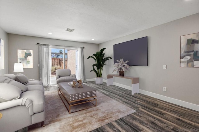 living room with dark wood-type flooring