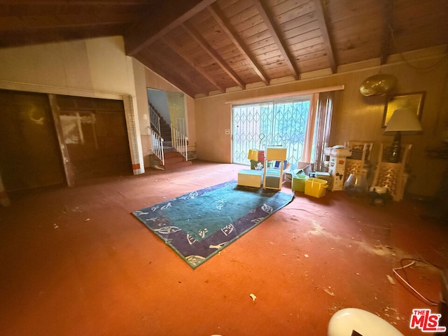 miscellaneous room featuring lofted ceiling with beams