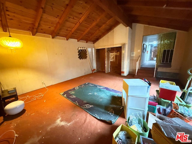 misc room featuring lofted ceiling with beams