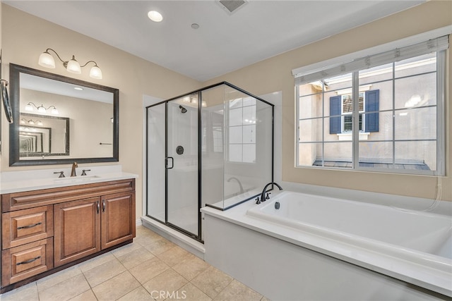 bathroom with vanity, independent shower and bath, and tile patterned flooring