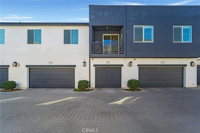 view of front of home with a balcony