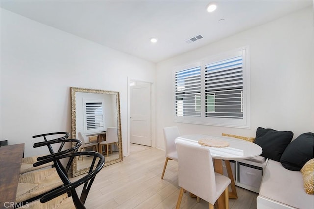 dining space featuring light hardwood / wood-style flooring