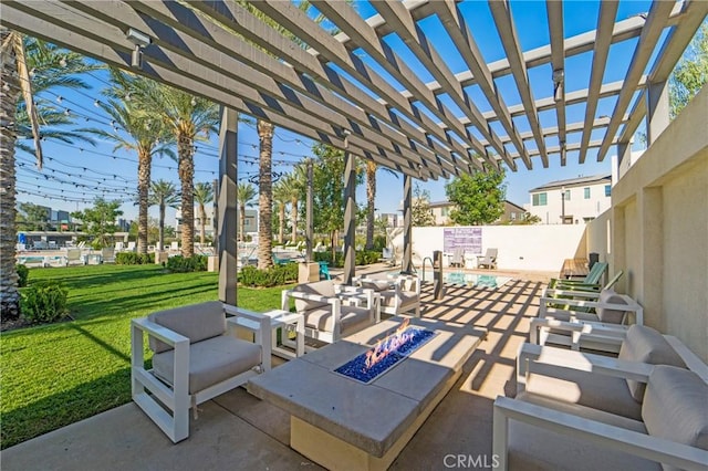 view of patio featuring a pool, a pergola, and an outdoor living space with a fire pit