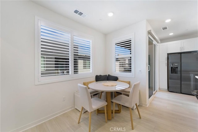 dining room featuring light hardwood / wood-style floors