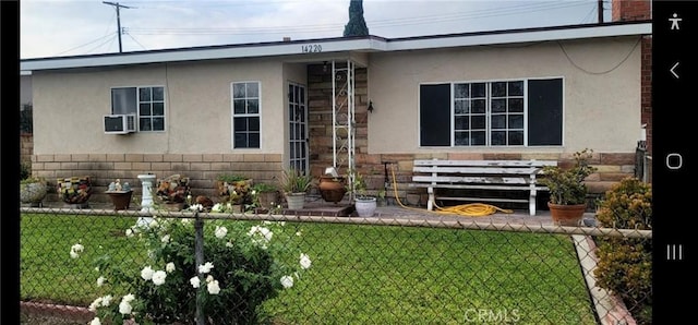 exterior space featuring a front lawn