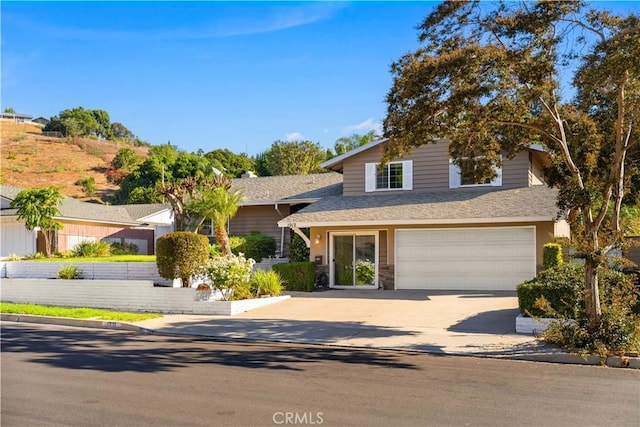 view of front of property with a garage