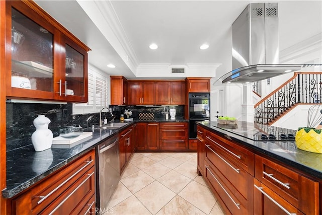 kitchen featuring black appliances, crown molding, sink, dark stone countertops, and island range hood