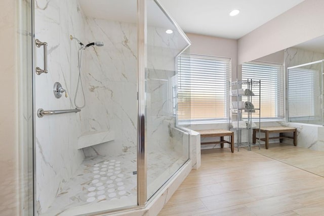 bathroom featuring an enclosed shower