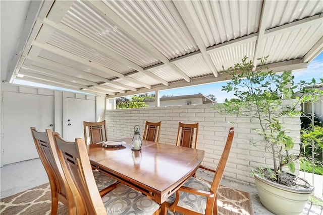 view of patio / terrace featuring outdoor dining area and fence