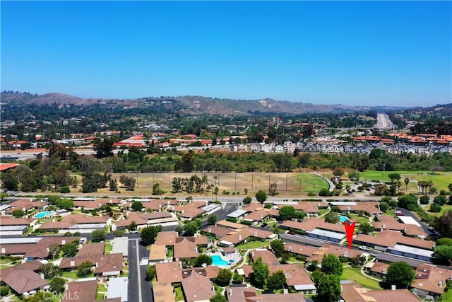 bird's eye view with a residential view and a mountain view