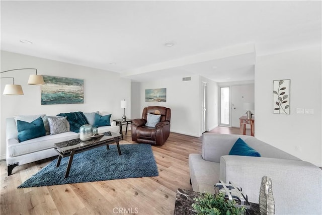 living room featuring light wood-type flooring