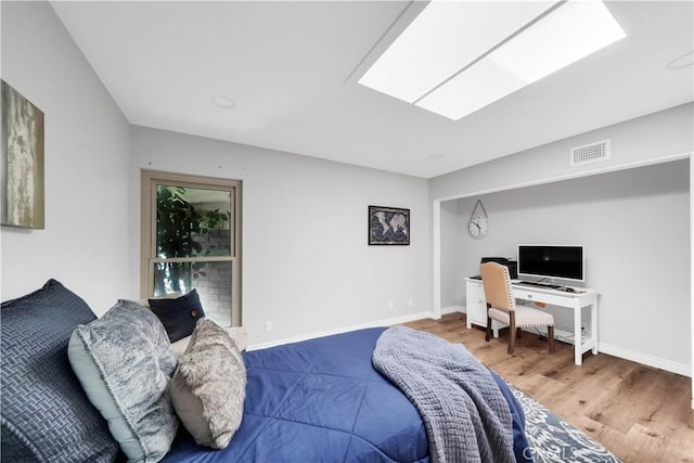 bedroom with wood-type flooring