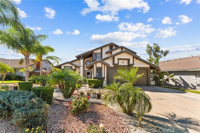 view of front of property with a garage