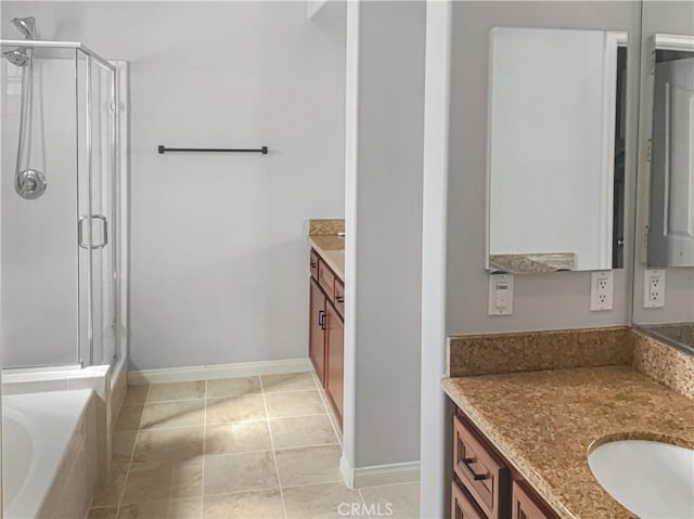 bathroom with vanity, shower with separate bathtub, and tile patterned floors