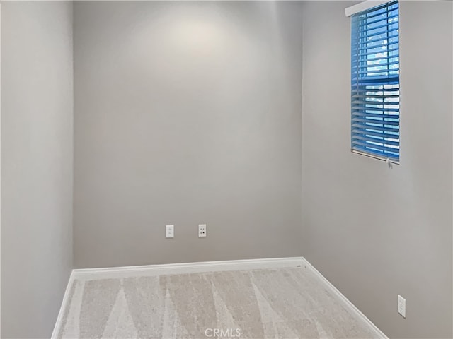 empty room with carpet flooring