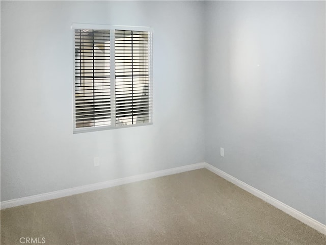 empty room featuring carpet flooring