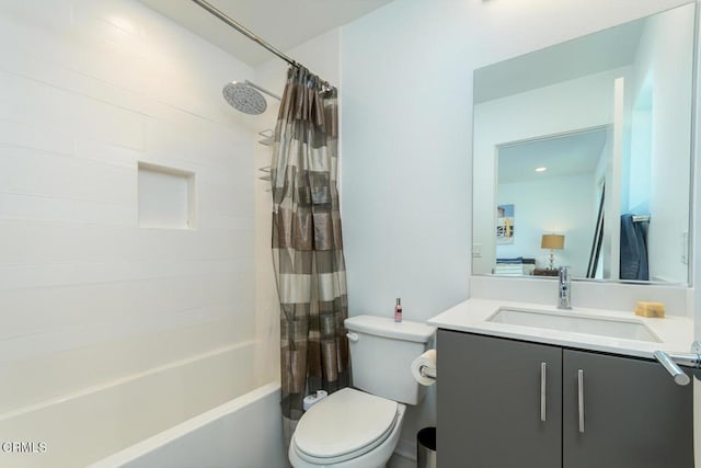 full bath with vanity, toilet, and shower / bath combination with curtain