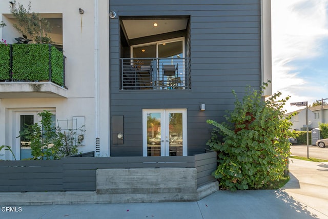 doorway to property featuring french doors and a balcony