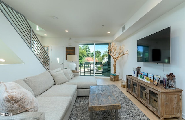 living room with wood-type flooring