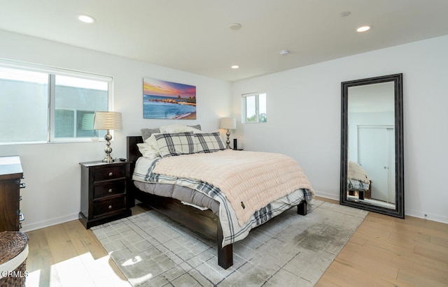 bedroom featuring light hardwood / wood-style floors