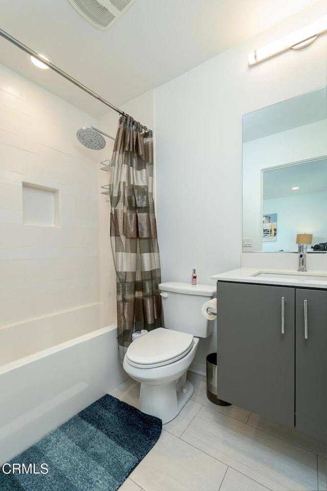 full bath featuring shower / bath combination with curtain, visible vents, tile patterned flooring, vanity, and toilet