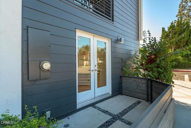 doorway to property featuring french doors