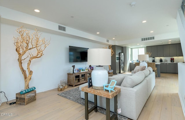 living room with light wood-type flooring