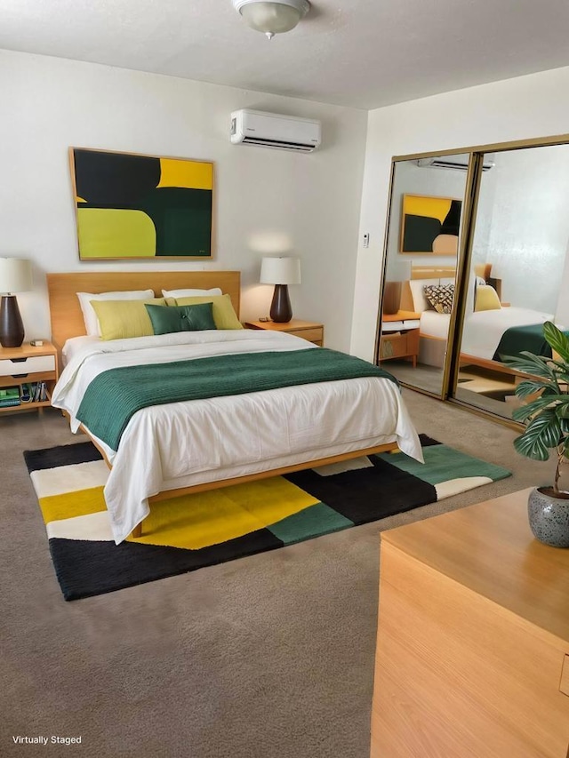 bedroom with a closet, carpet floors, and an AC wall unit