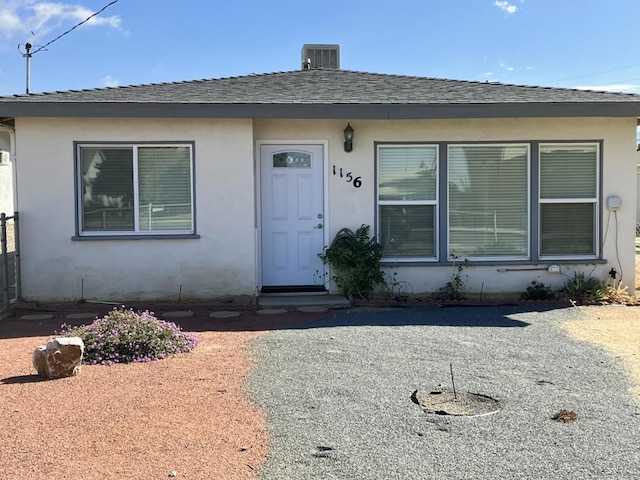 view of front of house with central AC unit